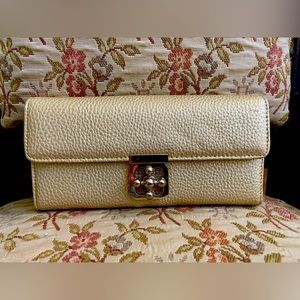 Soft gold pebble clutch